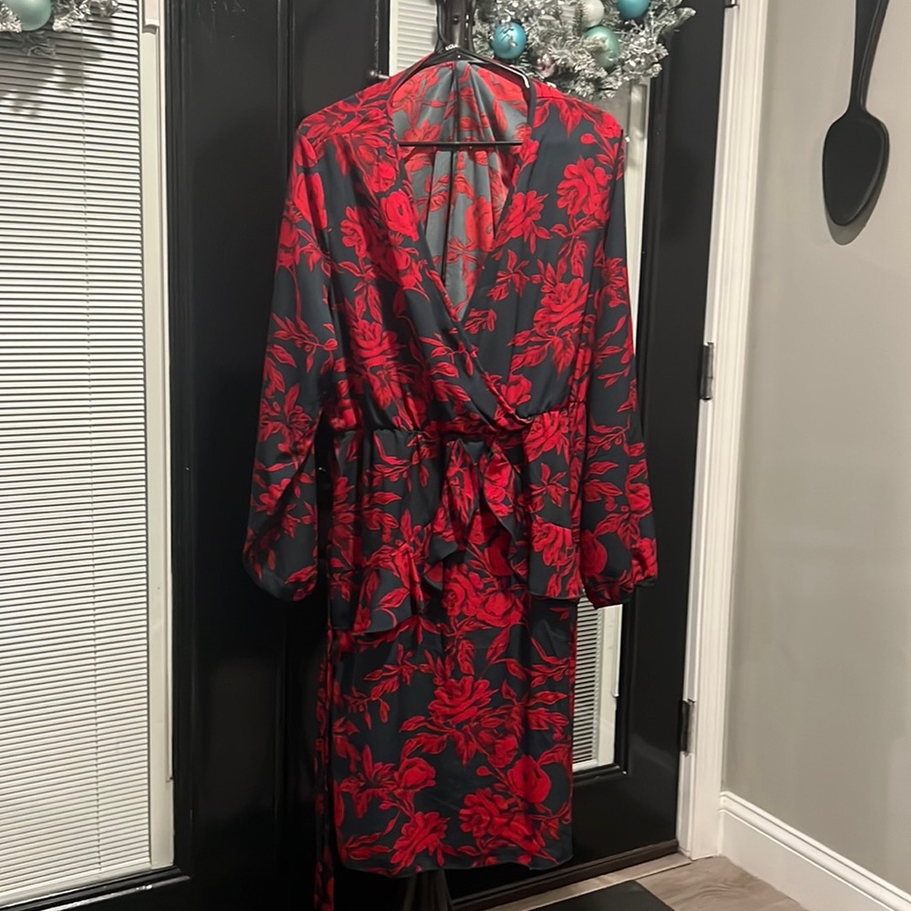 Beautiful, black and red wrap like dress. Never worn.